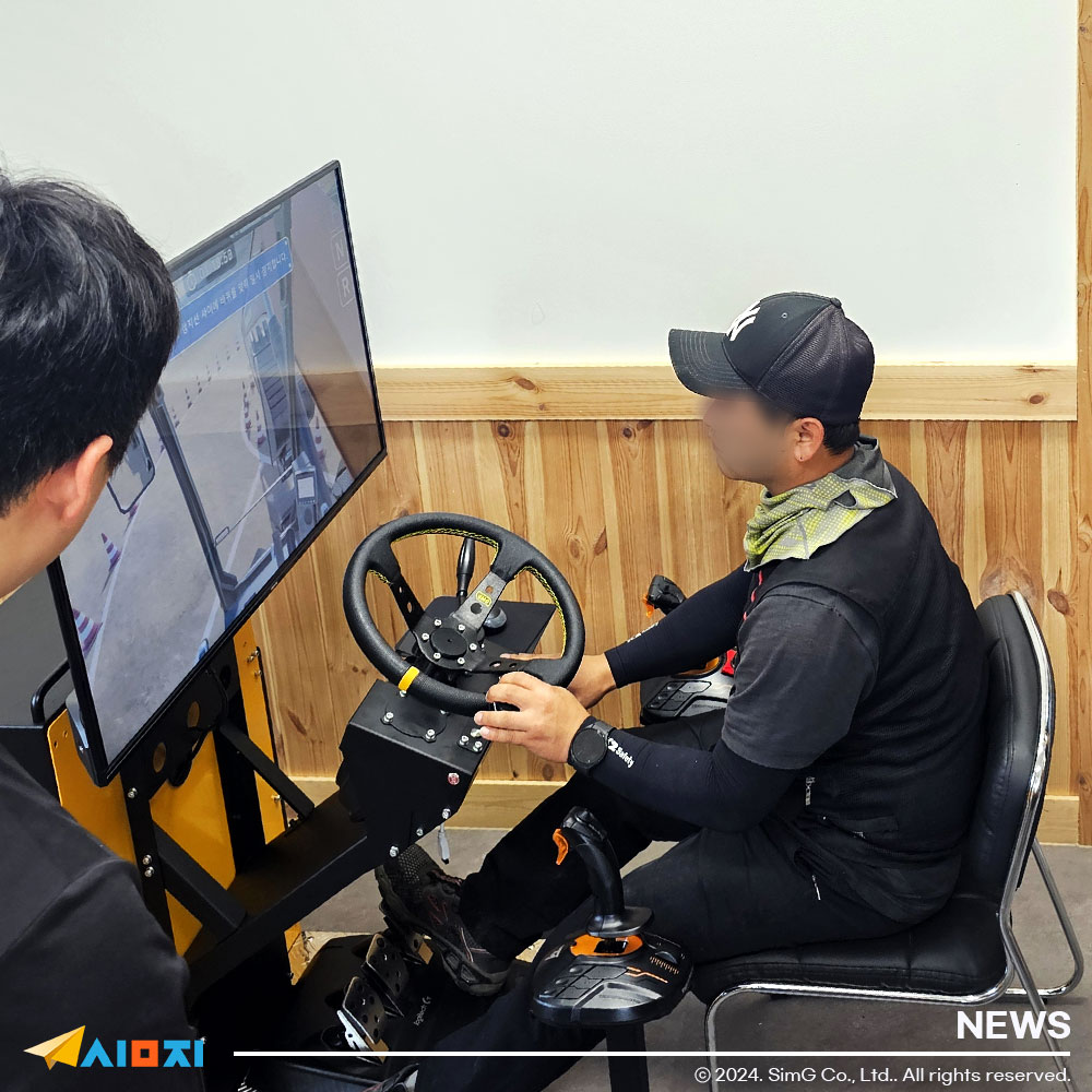 Side view photo of an excavator simulator demonstration